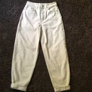 Divided white jeans